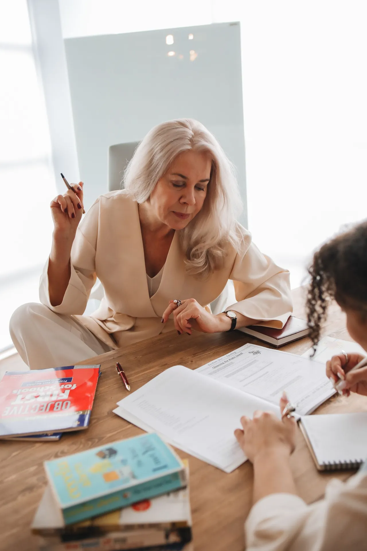An education adviser in conversation with a student